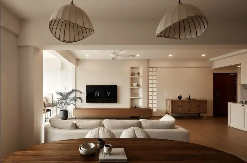 Living features: sofa with light fabric upholstery, coffee table, wall-mounted TV, wooden TV console, decorative plant in pot, 2 pendant lights with woven shades, ceiling fan, light wood flooring, built-in shelving unit, neutral painted walls, dining area visible in background, large windows for natural light; style: modern.