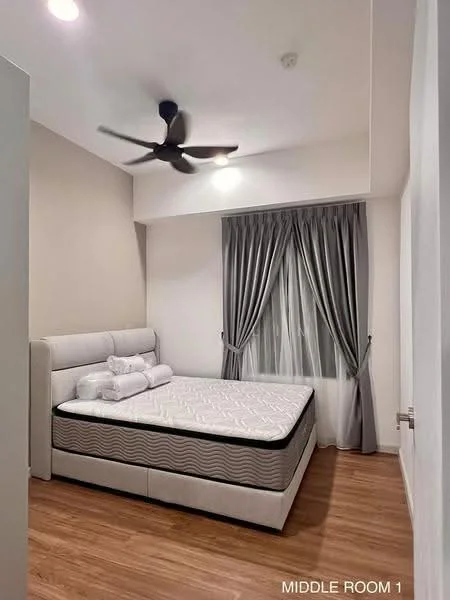 Bedroom features: queen-size bed, upholstered headboard, 2 white pillows, grey bed frame, wooden flooring, 5-blade ceiling fan, floor-to-ceiling window, grey curtains, neutral wall colour, decorative wall, nightstand, light source from ceiling; style: modern.