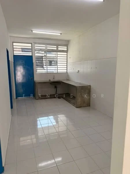 Kitchen features: white tiled flooring, white painted walls, grey concrete countertop, single-bowl stainless-steel sink, chrome faucet, large window with horizontal slats, blue door, fluorescent ceiling lights; style: modern.