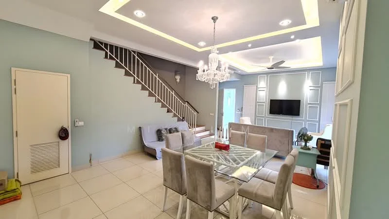 Dining features: 6-seater glass dining table, upholstered dining chairs in grey, chandelier, recessed downlights, cream painted walls, white ceiling with crown moulding, wall-mounted TV, open staircase with white railing, tile flooring, decorative wall paneling, green accent wall, area rug; style: modern. Living features: sofa in light grey, coffee table, TV console, wall-mounted TV, recessed downlights, cream painted walls, white ceiling with crown moulding, tile flooring; style: modern.
