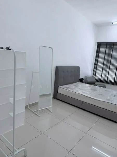 Bedroom features: queen-size bed with grey upholstered headboard, white bedding, white walls, large window with black blinds, tile flooring, full-length mirror, clothes rack, side table, desk chair; style: modern.