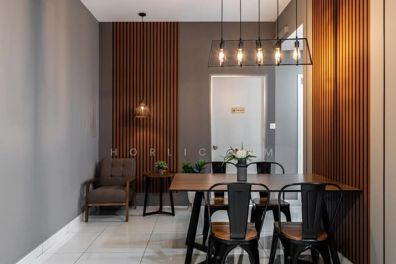 Dining features: grey painted walls, wood panel accent wall, white tiled flooring, rectangular dining table, black metal dining chairs, hanging pendant light fixture, wall-mounted light fixture, door with signage, indoor plants, wooden armchair; style: modern.