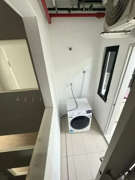 Laundry features: front-load washing machine, white tiled flooring, white painted walls, ceiling-mounted air conditioning unit, plumbing connection, door leading to another room.