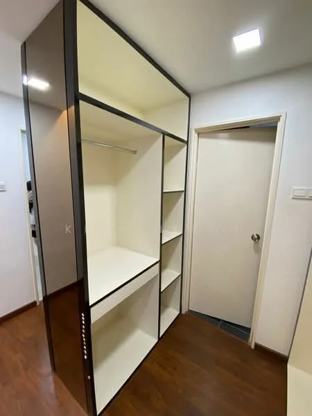 Room features: built-in wardrobe with open shelving, hanging rod for clothes, white interior finish, dark wood exterior finish, laminate flooring, recessed ceiling lights, neutral wall color, door leading to another room; style: modern.