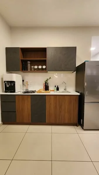Kitchen features: white countertop, dark grey upper cabinets, wooden lower cabinets, stainless-steel fridge, built-in sink, chrome faucet, coffee machine, kitchen utensils on countertop, ceramic tile flooring, open shelving, decorative vase with flowers; style: modern.