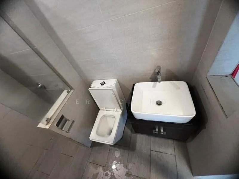 Bathroom features: white ceramic toilet, single-sink vanity with square basin, chrome basin mixer faucet, dark wood cabinet, grey tile flooring, grey wall tiles, glass shower enclosure, recessed lighting; style: modern.
