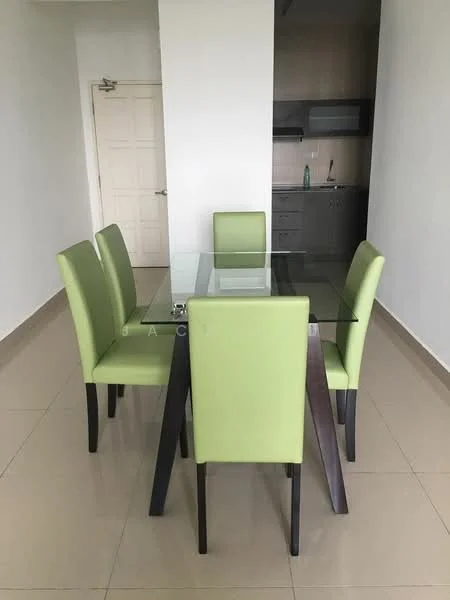 Dining features: glass dining table, 4 green upholstered dining chairs, cream tiled flooring, white painted walls, kitchen area visible in background, built-in kitchen cabinets, stainless-steel sink, microwave visible, kitchen countertop, neutral color scheme; style: modern.