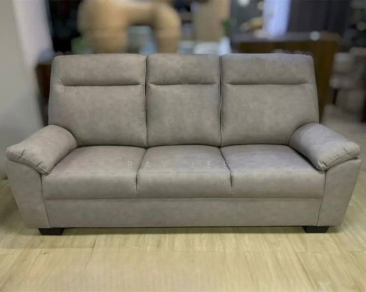 Living features: 3-seater fabric sofa in grey, light wood flooring, decorative wall art, coffee table, area rug, floor lamp, side table, cushions on sofa; style: modern.