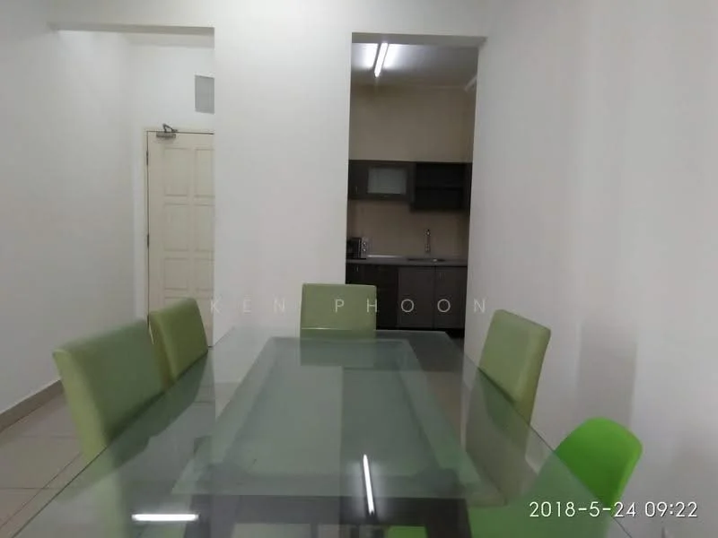 Dining features: glass dining table, 6 green upholstered dining chairs, white painted walls, tile flooring, recessed ceiling lights, open layout to kitchen, kitchen cabinetry visible in background, kitchen countertop visible in background; style: modern.