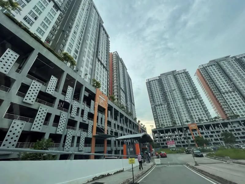 Exterior type: high-rise condominium; features: concrete facade, glass curtain wall, projecting balconies, multiple storeys, parking deck, landscaped areas, surrounded by greenery, urban context, driveway with interlocking pavers; style: modern.