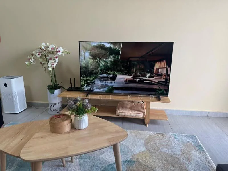 Living features: large flat-screen TV, wooden TV console, decorative indoor plants, coffee table with unique shape, area rug with abstract pattern, light-colored walls, ceramic tile flooring, soft furnishings on the console; style: modern.