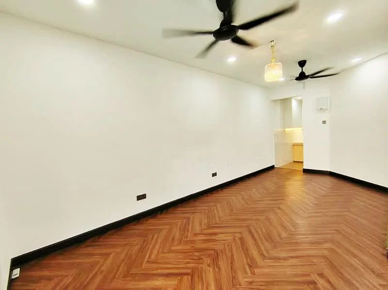 Living features: laminate wood flooring, white painted walls, recessed downlights, chandelier, 2 ceiling fans, open layout to kitchen, kitchen area visible in background, no visible furniture; style: modern.