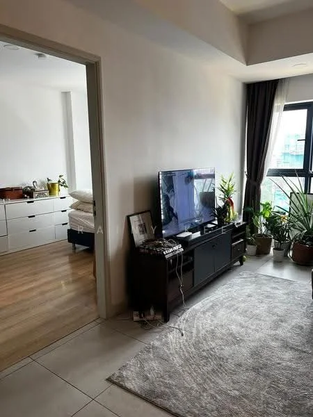 Living features: grey area rug, black TV console, wall-mounted TV, potted plants, large window with city view, curtains, wooden flooring, light-colored walls; style: modern; view: city. Room features: white painted walls, wooden dresser, bed visible in background.