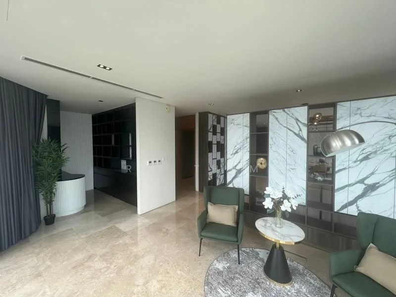 Living features: marble flooring, floor-to-ceiling windows, grey curtains, modern light fixture, green potted plant, round coffee table with marble top, two upholstered armchairs in green, decorative vase with flowers, built-in shelving with marble and dark wood finishes, accent wall with marble pattern; style: modern. Room features: open layout, neutral wall color, recessed lighting.