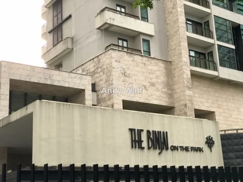Exterior type: mid-rise condominium; features: cream stone facade, glass balcony railings, recessed balconies, modern architectural design, landscaped entrance, signage with name 'THE BINJAI ON THE PARK', multiple storeys, surrounded by greenery; style: modern.