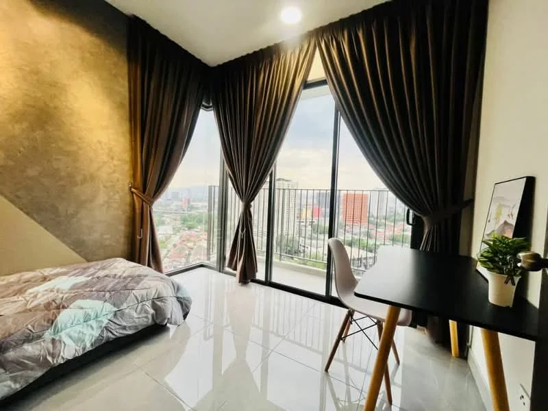 Bedroom features: queen-size bed with patterned bedding, floor-to-ceiling windows, city view, dark brown curtains, light grey accent wall, white walls, polished tile flooring, study desk with wooden legs, white chair, decorative plant on desk, recessed ceiling lights; style: modern; view: city.