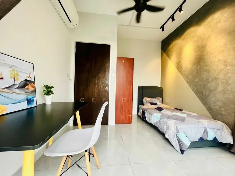 Bedroom features: single bed with grey bedding, white walls with grey accent wall, polished tile flooring, ceiling fan, desk with black tabletop, white chair, wooden door, air conditioning unit, window with natural light, decorative plant on desk; style: modern.