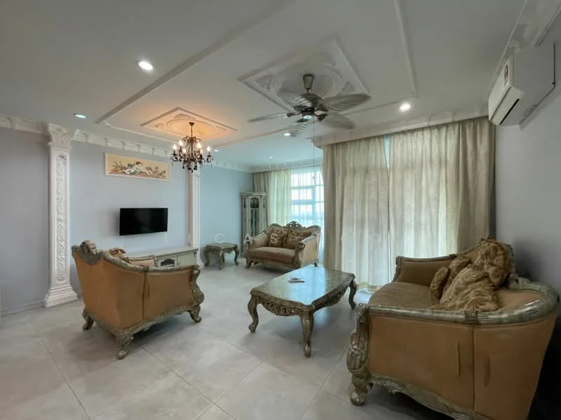 Living features: 5-blade ceiling fan with light, chandelier, wall-mounted TV, cream painted walls, white ceiling with decorative moulding, large windows with sheer curtains, two 3-seater sofas with ornate wooden frames, coffee table with ornate design, tile flooring, air conditioning unit; style: luxury.