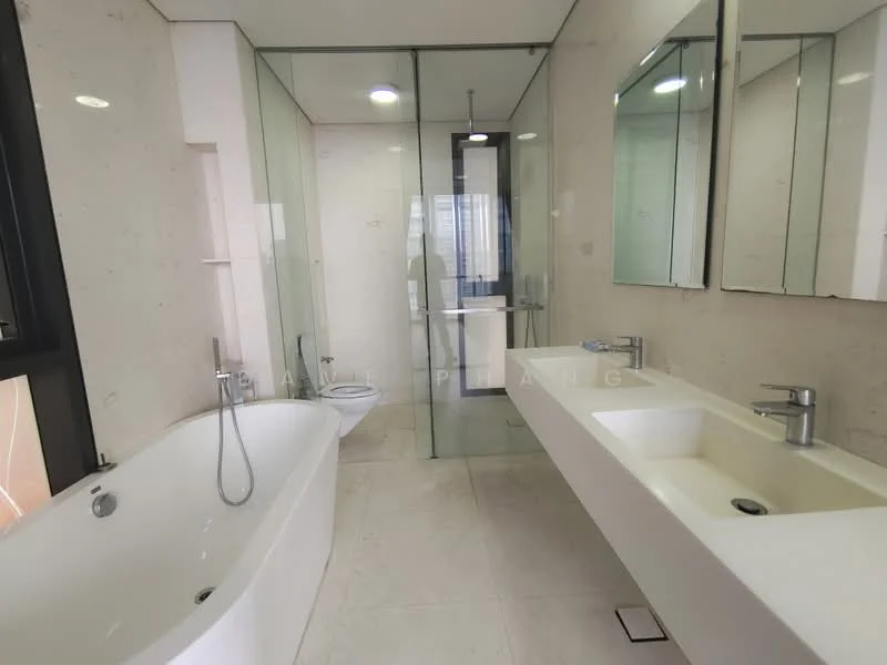 Bathroom features: freestanding bathtub, walk-in shower with glass enclosure, single-sink vanity with integrated basin, chrome basin mixer faucet, large wall-mounted mirrors, neutral stone wall cladding, light-colored tile flooring, recessed downlights, toilet, glass shower partition; style: modern.