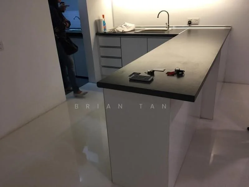 Kitchen features: black countertop, white cabinetry, single-bowl stainless-steel sink, chrome pull-down faucet, built-in cabinets, polished tile flooring, wall-mounted electrical outlets, kitchen island, clean minimalist design; style: modern.
