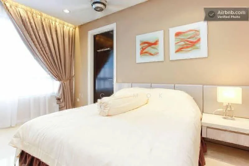 Bedroom features: king-size bed with upholstered headboard, white bedding, bedside table with lamp, framed artwork on walls, cream painted walls, floor-to-ceiling window with sheer curtains, ceiling fan, laminate flooring; style: modern.