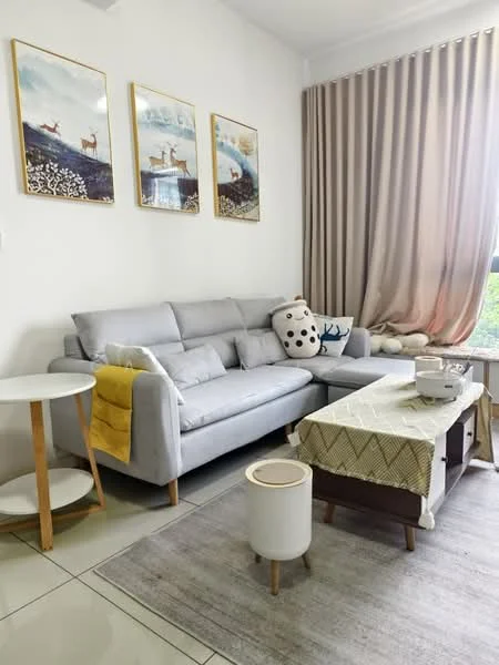 Living features: grey fabric 3-seater sofa, round white side table, wooden coffee table, area rug with geometric pattern, decorative throw blanket in yellow, framed artwork on walls, floor-to-ceiling window with sheer curtains, decorative pillow with animal design, light-colored curtains, small white stool; style: modern; view: garden.
