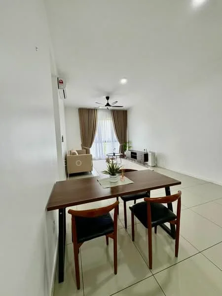 Dining features: dining table with wooden surface, 2 wooden dining chairs with black cushions, white painted walls, cream tiled flooring, 5-blade ceiling fan with light, floor-to-ceiling windows with sheer curtains, sofa in beige fabric, sideboard cabinet, decorative plant on table; style: modern.