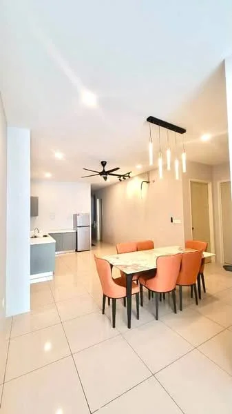 Dining features: 6-seater dining table with marble top, upholstered dining chairs in orange, pendant lighting with multiple bulbs, 5-blade ceiling fan with light, white painted walls, glossy tile flooring, open layout to kitchen, refrigerator visible in background; style: modern. Kitchen features: kitchen cabinetry in grey, stainless-steel fridge, countertop with space for appliances, open layout to dining area; style: modern.