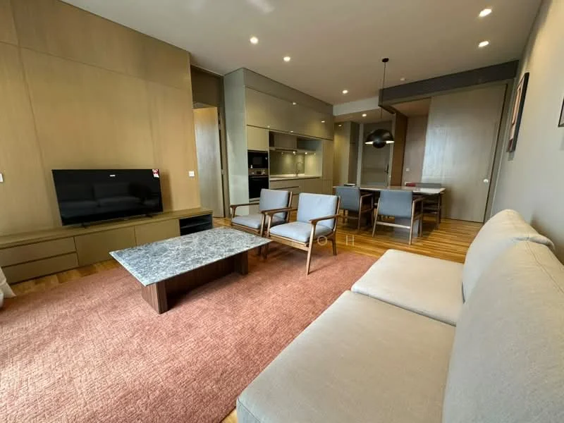 Living features: light wood flooring, grey fabric sofa, wooden armchairs, coffee table with marble top, TV console with storage, wall-mounted TV, recessed downlights, area rug with geometric pattern, open layout to dining area; style: modern. Dining features: dining table with grey upholstered chairs, pendant light above dining table, open layout to living area; style: modern.