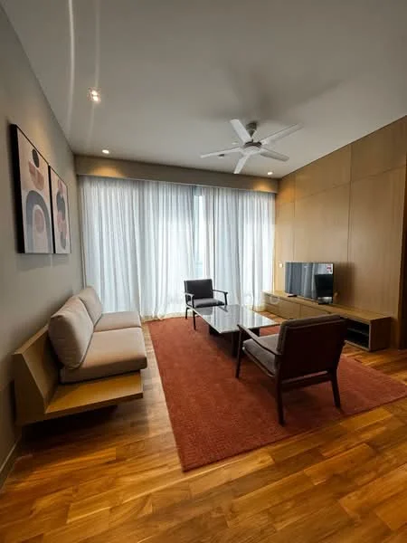 Living features: 3-seater fabric sofa in light color, 2 armchairs in dark wood, coffee table with dark surface, TV console with storage, wall-mounted TV, area rug in orange, wooden flooring, ceiling fan with light, large floor-to-ceiling windows with sheer curtains, wood paneling on walls, framed artwork on wall; style: modern; view: city.