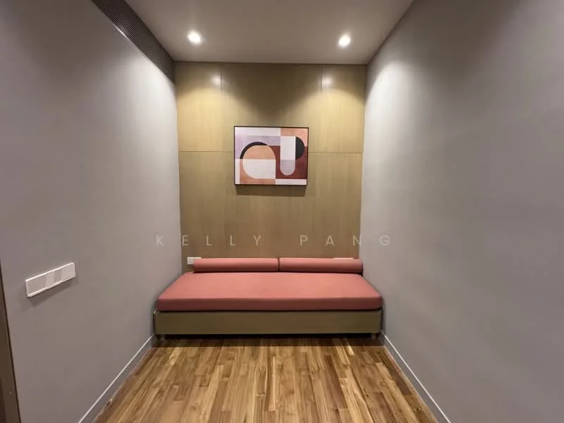 Room features: wooden flooring, grey painted walls, wood panel accent wall, framed artwork on wall, recessed lighting, sofa with red upholstery; style: modern.