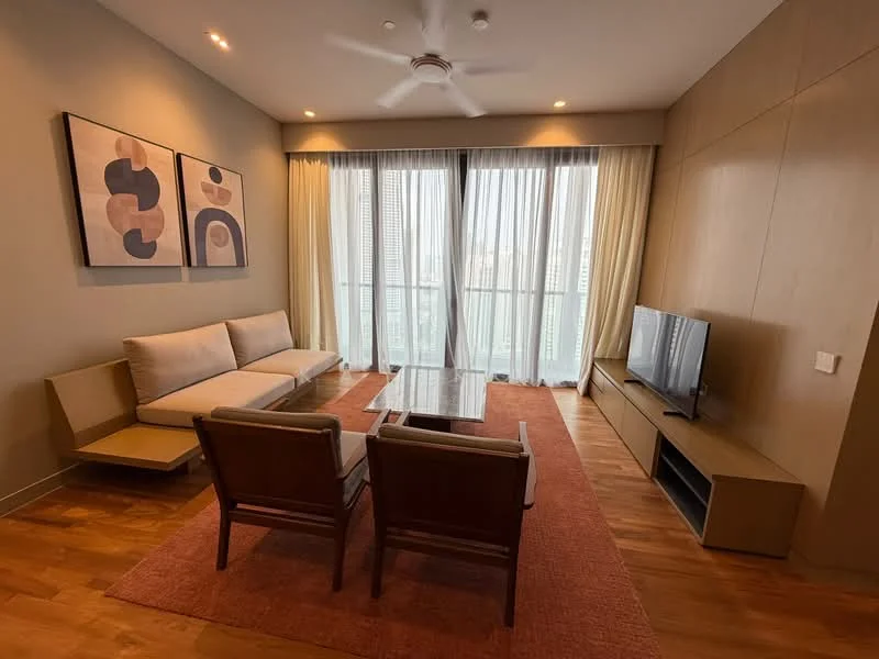 Living features: 3-seater fabric sofa in light grey, 2 armchairs in wood, glass coffee table, TV console with storage, wall-mounted TV, area rug with solid color, floor-to-ceiling windows, sheer curtains, wooden flooring, ceiling fan with light, decorative wall art; style: modern; view: city.