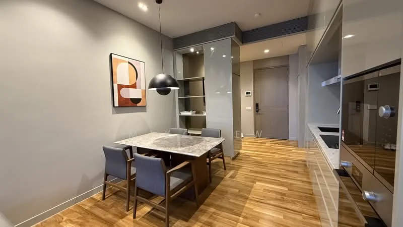 Dining features: marble dining table, 4 wooden dining chairs, pendant light fixture, grey painted walls, wooden flooring, built-in cabinetry, wall-mounted shelves, doorway to hallway; style: modern. Kitchen features: stainless-steel built-in oven, stainless-steel microwave, flat-panel cabinetry, kitchen countertop with storage, integrated appliances; style: modern.