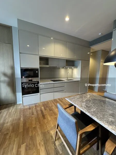 Kitchen features: grey cabinetry, built-in oven, stainless-steel sink, chrome pull-down faucet, marble countertop, integrated refrigerator, flat-panel cabinet doors, wooden flooring, recessed downlights; style: modern.