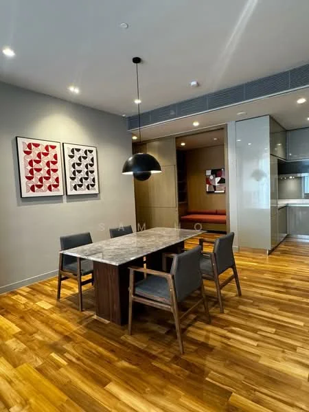 Dining features: wooden dining table with marble top, 4 upholstered dining chairs, pendant lamp, grey painted walls, wooden flooring, framed artwork on walls, built-in cabinetry, open layout to kitchen area; style: modern.