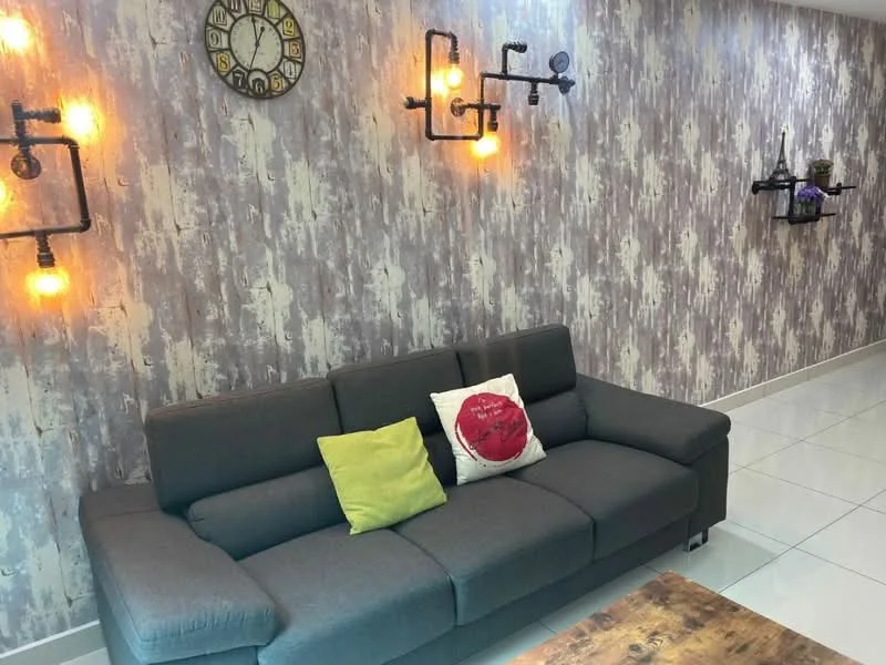 Living features: grey fabric sofa, green accent cushion, red decorative pillow, wooden coffee table, wall-mounted shelves, decorative wall clock, industrial-style wall sconces, textured wallpaper, glossy white tile flooring; style: modern.