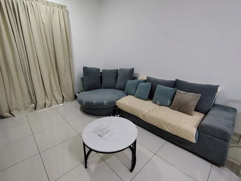 Living features: L-shape sectional sofa in grey, decorative cushions in various colors, round coffee table with white top and black legs, cream throw blanket on sofa, floor-to-ceiling curtains in beige, glossy white tile flooring, plain white walls, minimalist decor; style: modern.