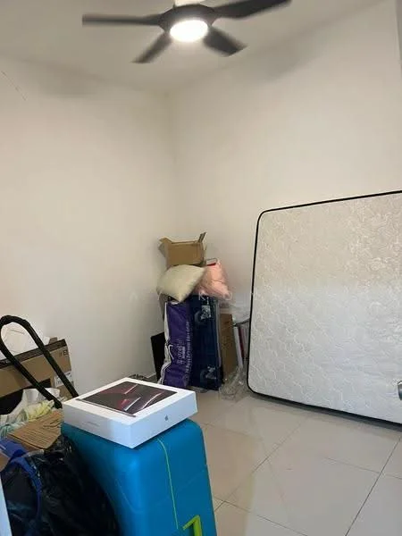 Room features: white painted walls, ceiling fan, glossy tile flooring, mattress on the floor, stacked boxes, luggage, cardboard boxes, miscellaneous items.