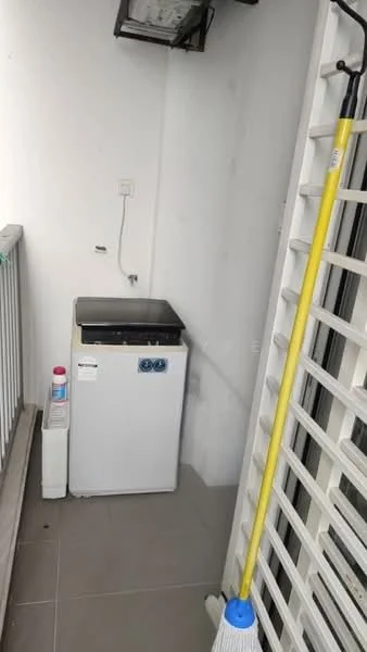 Laundry features: top-load washing machine, small fridge, grey tiled flooring, white walls, balcony railing, mop, cleaning supplies, outdoor light fixture.