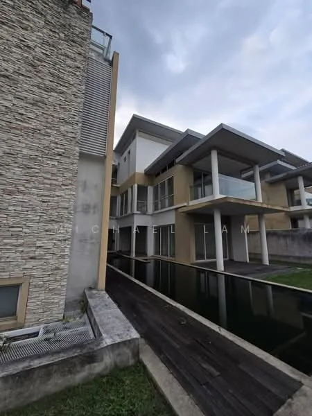 Exterior type: detached bungalow; features: stone cladding on facade, flat roof, two-storey building, large glass windows, projecting balconies, wooden deck, water feature, manicured lawn, surrounded by greenery; style: modern.