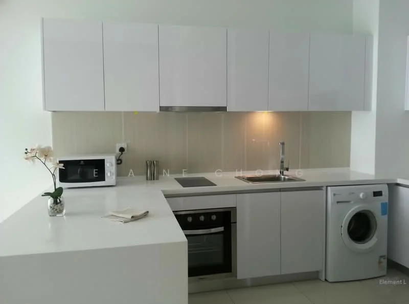 Kitchen features: white flat-panel cabinets, stainless-steel built-in oven, stainless-steel cooktop, stainless-steel range hood, single-bowl stainless-steel sink, chrome pull-down faucet, white quartz countertop, ceramic tile backsplash, microwave, front-load washing machine, light-colored tile flooring, decorative plant, kitchen island; style: modern.