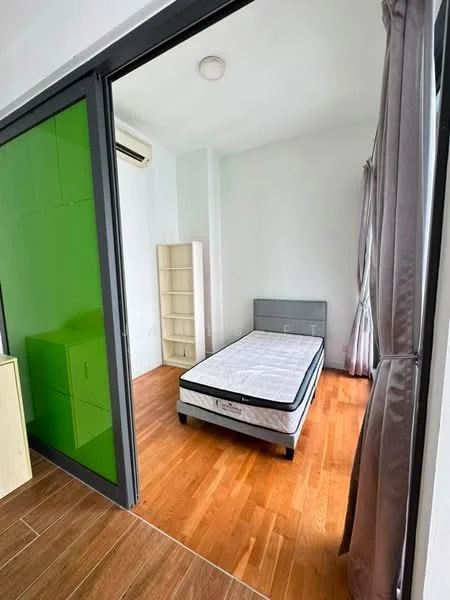 Bedroom features: wooden flooring, white painted walls, grey upholstered headboard, single bed, floor-to-ceiling windows, curtains, built-in wardrobe with green panel, air conditioning unit; style: modern.