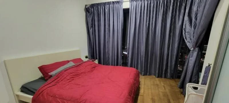 Bedroom features: king-size bed with red bedding, grey throw blanket, floor-to-ceiling windows, dark grey curtains, wooden flooring, nightstand, wall-mounted light fixture, laundry basket; style: modern; view: city.