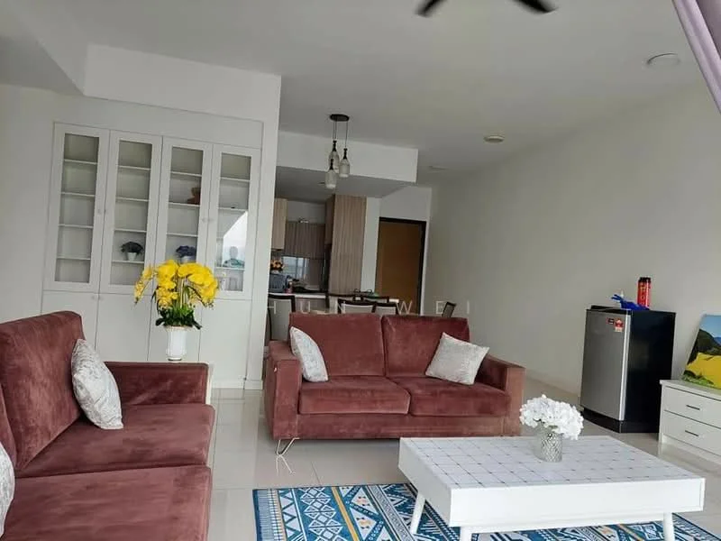 Living features: 2-seater fabric sofa in burgundy, 3-seater fabric sofa in burgundy, coffee table with white surface, area rug with geometric pattern, floor-to-ceiling windows, light fixture with pendant lights, decorative vase with yellow flowers, built-in shelving unit with glass doors, white walls, tile flooring, ceiling fan; style: modern. Kitchen features: stainless-steel fridge, wood cabinetry, open layout to living area; style: modern.