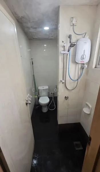 Bathroom features: white tiled walls, black tiled flooring, one-piece toilet, shower area with glass partition, handheld shower head, water heater, wall-mounted mirror, sink with faucet, towel rack, light fixture, door with handle; style: modern.