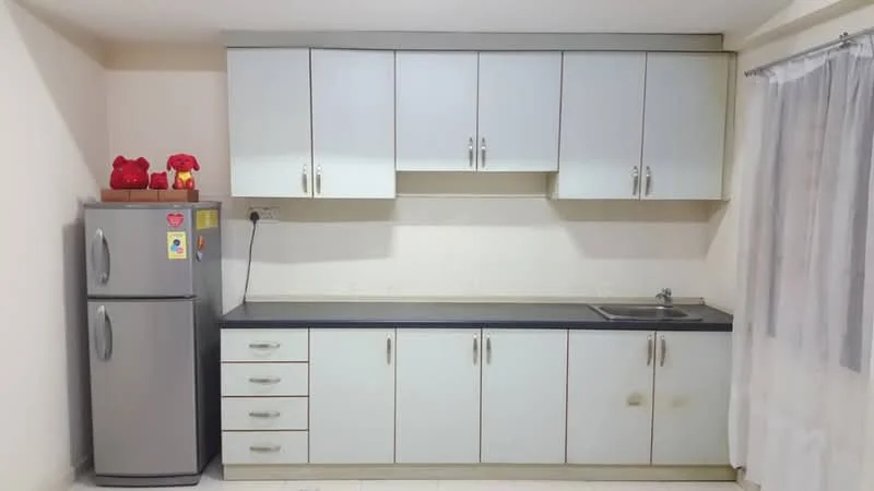 Kitchen features: grey countertop, white cabinetry with flat-panel doors, stainless-steel fridge, single-bowl stainless-steel sink, chrome faucet, wall-mounted cabinets, floor-to-ceiling window with sheer curtains, tile flooring; style: modern.