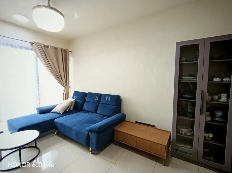 Living features: blue L-shape sectional sofa, white round coffee table, glass display cabinet, cream painted walls, tile flooring, curtains in beige, ceiling light fixture, decorative items in cabinet; style: modern.