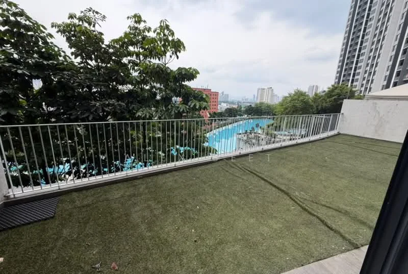 Room features: artificial grass flooring, metal railing, view of swimming pool, city skyline in background, surrounded by trees, outdoor space; view: pool.