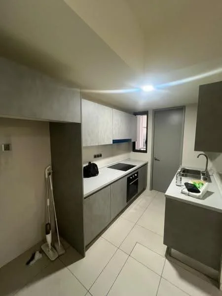 Kitchen features: grey cabinetry, white countertop, built-in oven, electric cooktop, stainless-steel sink, chrome pull-down faucet, tile flooring, wall-mounted cabinet, under-cabinet lighting, window with view, cleaning mop, black bag on countertop; style: modern.