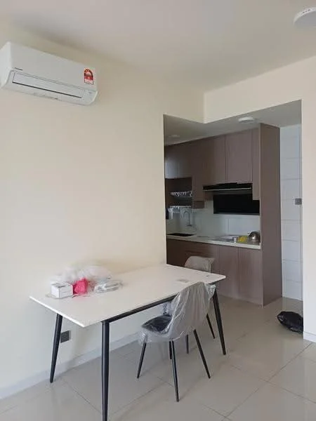 Dining features: white walls, tile flooring, dining table with white surface, black legs on dining table, plastic-covered dining chairs, 1 wall-mounted split AC; style: modern. Kitchen features: brown cabinetry, black built-in oven, white backsplash, stainless-steel sink, countertop with space for appliances; style: modern.
